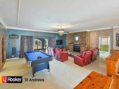  14-16 Muscat Place, ESCHOL PARK NSW 2558 The ambiance of this Spanish inspired home will leave you breathless with its character and charm. 
All four oversized bedrooms open into double brick and rendered arches 
surrounding a spectacular solar heated in-ground swimming pool. 
 
This tranquil double brick residence is positioned beautifully on two 
blocks of land totaling 1187 sqm at the end of a small cul-de-sac 
backing onto a reserve giving you the peace of wild life not traffic. 
The size and layout is great for the extended family or dual occupancy so why not bring the in-laws. 
 
- 4 Bedrooms with built in robes + Study 
- 3 oversized updated bathrooms (two as ensuites ) 
- Huge formal lounge with fireplace 
- Separate formal dining room 
- Bar room 
- All with high ornate ceilings 
- Quality tiled floors and timber blinds through out 
- All new kitchen appliances 
- Large rumpus room with toy room 
- Alarm system 
- Out door entertainment area with separate BBQ cabana area and sand pit 
- Tropical solar heated in-ground pool 
- Grand front gates with hedged entrance 
- Double separate garage and single carport 
- Low maintenance yard and gardens despite is size 
- Walking distance to school, shops and public transport. 
 
The present owners have told me that they are still in disbelief that 
they are leaving and that this has been their dream home with many happy
 memories, but hope that now it will be some other lucky family's dream 
home now. 
TIME TO LIVE YOUR DREAM 
 
 Read more at http://standrews.ljhooker.com.au/965H9H#9vMBGSeXUmSK1gg4.99 