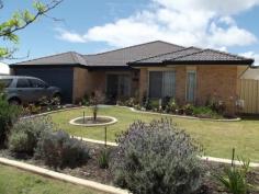  3 Nuchea Vista Lakelands WA 6180 SPACE TO BURN This spacious 4 bedroom, 2 bathroom home has all the elbow room you've been craving. With 3 separate living areas, huge kitchen with extra cupboards, loft in roof cavity, verandahs to 2 sides, a spa and some lawn for the kids to romp, there's space for everyone & everything. Features:- * Approved grey water system to front lawn * Solar HWS with gas booster * 8 Solar panels producing 1.8kw at 48c Govt rebate * Vegie patch and established fruit trees * Retic to front & rear off mains * All bedrooms have reverse cycle A/C * Reverse cycle A/C to main living area * Gas hot plate & electric oven * Excellent location in a quiet "child friendly" street * Bus stop nearby * 5 min walk to Baptist College & Lakelands Primary * Nearby parks all round * 2 min drive to local shops * 3 min drive to major shopping centre Other features: Garden 