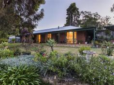  18 Wandoo Street Mount Nasura WA 6112 4 Bed, 2 Bath UNDER $480K! Enjoying a prime hillside position from its highly desirable locale, this circa 1990s brick and iron constructed residence represents a super rare opportunity to acquire a 4 bedroom 2 bathroom family home for under $500,000! Focused to enjoy the sun-drenched northerly vistas across the majestic Brookton Valley, it sports distinct federation tones throughout including verandahs all around.  With casual living of the essence, the gorgeous alfresco courtyard offers substantial privacy for endless entertaining, whilst the 966sqm lot forms the perfect children's playground. General Features Property Type: House Bedrooms: 4 Bathrooms: 2 Land Size: 966 m² (approx) Indoor Features Air Conditioning Outdoor Features Carport Spaces: 2 Other Features Family Room, $479,000 