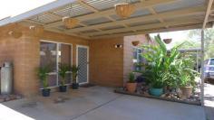  3/8 Patterson Cres Larapinta NT 0870 Come Home and Relax, all the hard work is done here. Located in a small very private complex of only seven. This modern, spacious well-appointed, quality unit will be a pleasant surprise for a first home buyer or astute investor.  The large open plan living/ dining area is adjacent to the well equipped kitchen which is ideal for entertaining family or friends, There is a wide breakfast bar with lots of bench and storage space, double sink, and oven with range hood. This area is bathed in lovely natural light in the afternoons. As is the spacious second bedroom which is at the back, abundant natural light is a feature throughout. The main bedroom at the front offers two way access to the large luxury bathroom, with a full bath to soak away the stresses of the day, and separate walk- in shower, vanity and toilet. It can serve as a personal en suite, or can conveniently service house guests or visitors as required. The Back verandah and courtyard have been beautifully landscaped and planted to allow for maximum outdoor living space and minimum maintenance. There are no rear neighbours and the open space is council maintained.  At the front there is vehicle parking UMR and a wide verandah. The Complex backs onto picturesque Crown Land, a great place for an early morning walk. This quality property may be sold furnished if required.  