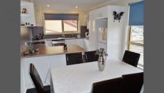  5/23 Heather Crescent, Park Grove, TAS 7320   $249,000 Presented is this very level Unit, approx 97m2,and located in a beautiful, quiet and peaceful, natural bush rural setting, elevated with relaxing urban and parkland views. Features Include: *2 large and spacious bedrooms with large built-in robes *Light and very spacious open plan lounge and dining *Excellent kitchen, ample bench space & cupboards plus dishwasher *Large Bathroom *Internal laundry *Large Decking for fresh air, sun and shade *Carpet in bedrooms *Single lockup garage, internal access, storage area *Extra parking in front of unit plus extra visitor parking 