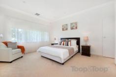 9 Carunta St Wattle Park SA 5066 Auction $780,000 - $835,000 Just move in to this elegant 4 bedroom home and enjoy an easy lifestyle. Separate formal lounge, beautiful modern kitchen which is the centre of activities overlooking the large family dining area with solid oak flooring and the easy maintained rear garden. Filled with light, this reverse cycle ducted home also offers both the master and large guest bedroom individually have their own ensuite. With all bedrooms boasting extensive built in robes and storage the home will cater for the whole family. The undercover outdoor entertaining area has plumbed gas and a sink. The summer BBQ is just waiting. A drive through remote roller door garage allows rear garden access and parking for two cars. Electronic alarm and quality fittings throughout this home is sure to please. 