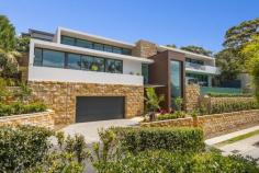  Mosman, NSW 2088 Holding an absolute Balmoral address, no expense was spared with the 
construction of this brand new luxurious architectural home. Set on 
gorgeous wooded grounds with sun drenched easterly aspect, and across 
three floors offering breathtaking panoramic water views overlooking 
middle harbor at all living space, this exclusive spectacular residence 
 represents a unique home to live with a life seamlessly combing 
comfort, tranquility, modernity, and connecting into the native 
environment. Nature, light, space and style are the defining 
characteristics of this exceptional luxurious family home. Striking use
 of horizontal elements, straight lines, natural light & 
ventilation, high ceilings, and full-height glass creates the most open
 concept floor plan with sweeping panoramic harbor views, offering an 
ever-changing backdrop. By using natural materials such as 
sandstone, timber and marble, the building appears to stay connected, 
sit comfortably and peacefully into the native environment. Features: • All living spaces have breathtaking panoramic harbor views. • 4 ensuite bedrooms with huge walk-in wardrobe, study room, wine cellar, and home theater. • Magnificent wet edge swimming pool has expansive harbor views. • Exclusive high-spec custom-made finishes with strong attention to detail. • Double glazed and heat reflective coatings on windows. • Italian designed and made lift with commercial standards. • High-end Italian Calacatta marble throughout the bathroom and laundry. • Exclusive kitchen with Gaggenau appliances • Kohler bathroom and kitchen fittings. • Australian Blackbutt, extra long and wide timber floor • Australian rock-face sandstone wall cladding. • Car turntable • C-Bus technology • Under floor heating • ducted reverse-cycle air conditioning Please contact Monika Tu on 0409 898 888 for more information and to arrange an inspection. 
