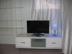  4 Bellicent Road Bracken Ridge Qld 4017 This beautifully presented spacious fully furnished ground level two bedroom apartment is self-contained complete with modern kitchen, bathroom, separate toilet, and access to washing machine and clothes line. Both bedrooms have built-in mirrored wardrobes with shelves and hanging space, and curtains. New furniture consists of white leather lounge, large television with white cabinet, round glass dining table with four stainless steel and white leather chairs, large fridge, beds and coffee table. The kitchen is complete with stainless steel gas cooktop with range hood, electrical appliances (microwave, toaster, and electric kettle), plates, mugs, glasses, cutlery, saucepans and cooking utensils. The apartment boasts a breezy open plan living area incorporating white and blue tones throughout. An undercover area outside is perfect for meals or enjoying the established tropical gardens. The property is fully fenced with front security gate offering privacy and security. 
