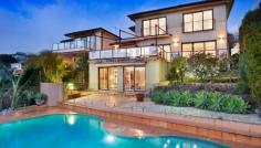  35 Gordon St Clontarf NSW 2093 Set against an inspiring 180 degree panorama with Middle Harbour 
views forming its dazzling centrepiece, this exceptional residence 
provides a haven of luxurious liveability and spectacular in/outdoor 
entertaining. Placed on easycare grounds with a sparkling pool, it is 
nestled in one of the area's most exclusive addresses. Gaze over Sandy Bay to The Spit's yacht sprinkled marinas Views stretch to the North Sydney and Chatswood skylines Vast living space and separate dining room flow to terrace Sweeping sun drenched harbourside entertainers' terrace Media room, upstairs family room, powder room by the entry Bosch equipped CaesarStone kitchen, gas stove and dishwasher Double bedrooms with built-ins, main and guest with ensuites Cabana/guest retreat with bathroom, sunny poolside terrace Storeroom, ducted heating, surround sound, plantation shutters Double carport, stroll to village, schools and Clontarf Beach View by appointment. Contact Kingsley Looker 0411 225 556 Council: $3,584pa approx 