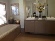  11 Paperbark Parade Aberglasslyn NSW 2320 This McDonald Jones former display home is one of a kind with luxury fittings throughout the entire property. This home can only be described as simply breath taking! Features include: * Ducted air conditioning & sensor lights throughout. * Grand foyer with inbuilt desk, timber flooring and beautiful artwork * Off the main entrance you will find a "teenagers or guest retreat" complete with three carpeted bedrooms all with built in robes & timber shutters, carpeted lounge room and study. This area also includes a second bathroom complete with shower, deep bath & separate toilet. All rooms are generous in size. * A second formal lounge is located off the kitchen with low lying window perfect as a theatre room. * A third living area is a feature in itself with floor to ceiling glass window with an outlook of the pond, gardens and water feature.This room has timber flooring and doors open wide onto the entertainment deck. GENERAL FEATURES Bedroom:  4 Bathrooms:  2 Fully Fenced EXTERNAL FEATURES Balcony Courtyard Deck Outdoor Entertaining Area INTERNAL FEATURES Built In Robes Dishwasher Ducted Cooling Ducted Heating $570 weekly Available Now Bond:  $2,280 