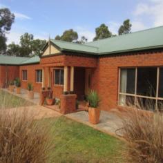  124 North Boundary Road Hamilton VIC 3300 Country Home in the City. Edge of Town Hideaway! This three BR plus study or 4 BR brick veneer home on nearly an acre of land, really is a home among the gum trees, as it has plenty of space and plenty of trees on which to look. The home has three good storage or work sheds as well as an attached double garage. The property is in excellent condition, with two living rooms, a very spacious kitchen and two heating sources- a wood combustion heater and a Rinnai gas space heater. Each bedroom has built in robes, with the master having an extensive new walk through wardrobe and beautiful en suite bathroom. All carpets and paintwork etc are in very good order. A large decked area at the rear of the home is just perfect for barbecues and outside living. A completely relaxing family home. 124 Nth Boundary Road, Hamilton $395,000 http://www.consumer.vic.gov.au/housing-and-accommodation/buying-and-selling-property/checklists/due-diligence View Sold Properties for this Location View Auction Results General Features Property Type: House Bedrooms: 4 Bathrooms: 2 Building Size: 232.26 m² (25 squares) approx Land Size: 3642 m² (approx) Price per m²: $108 Indoor Features Ensuite: 1 Living Areas: 2 Toilets: 2 Built-in Wardrobes Dishwasher Gas Heating Outdoor Features Secure Parking Garage Spaces: 4 Open Car Spaces: 4 Outdoor Entertaining Area Shed Fully Fenced $395,000 