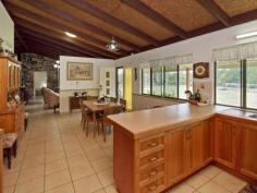 56 London Creek Road, Peachester, 4519 Northfacing, private Bessa Block home, nestled on 8 acres of land 
with 360 degree views, including Mt Beerwah, Mt Mellum, and Mary 
Cairncross Park.  Perfect for Horses! 
 HOUSE FEATURES: 
* The house is full of character with fully insulated raked ceilings and
 a solid stone feature wall between lounge room and main bedroom. 
Wrap around verandah from Front Door around end of house (BBQ area) 
* 4 bedrooms — main bedroom has a large changing room attached 
* 3 car spaces in shed and the 1 attached to the house. 2 open car spaces and 2 secure car spaces. 
* Single garage attached to western end of house -could easily be 
converted to a self-contained granny flat with TV outlet, lights and 
electricity already installed. 
* Lounge room, large kitchen and dining room with large walk in pantry and full gas cooking stove top and wall oven. 
* Ample bench and cupboard space. 
* Large bathroom with built in storage cupboard, separate large shower, vanity and bath. 
* Home is tiled throughout for easy cleaning. 
* Wood fire/heater with plentiful supply of firewood from land. 
* Bosch Hot water system with instantaneous turbo ignition gas. 
* Automatic tank switch when one gas tank runs out. 
* Outside lighting at front, end and back of house. There are 2 Flouro lights in BBQ area. 