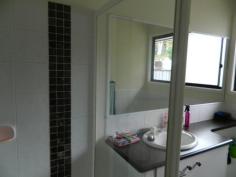  22 Huntingdale Drive   NAMBOUR   Qld   4560 3 Bedroom highset home, with entertainment area out back. On a 714m2 block.Solar hot water. Park across the road for the children to play. Room under for further development. Long time tenants on secure lease. 