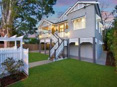  12 Dewar Terrace Sherwood QLD 4075 This beautifully presented, meticulously renovated Queenslander, on a 
wonderful, deep 888m2 flat block, sets the bench mark for fabulous 
family living. The original home dates back to around 1900 and the 
architect has successfully blended classic charm with contemporary 
style. 
 
The main living areas are so generous in space, with their 12ft high VJ 
ceilings, an abundance of windows and floor to ceiling b-fold doors that
 allow a smooth flow, out to the large, covered rear entertainment deck,
 that overlooks the lush flat lawn and rear gardens. 
 
Linked to these living areas is the most marvelous kitchen. From the 
beautiful Caesar stone bench tops, state of the art appliances, wide 
usable work stations, well-crafted cupboards, Butler's sink, and 
Butler's pantry, to the extras that just give this space the 'wow' 
factor. It's the light, the design, the quality of the workmanship that 
makes such a statement. 
 
There a four bedrooms and two bathrooms on this level, with the master 
suite consisting of original French doors opening out to the wide front 
veranda, an extensive walk in robe (with a wardrobe lift) and an 
immaculate ensuite, where the choice of texture and colour blend so well
 with the classic style bedroom. 
 
A wide internal staircase, crafted from beautiful 'Kwila'timbers, with 
an iron balustrade, leads you down to the lower floor, where another 
generous living area, complete with wet bar/mini kitchen allows you to 
entertain in a relaxed manner. Linked to the outdoors via floor to 
ceiling bi-fold timber doors, the room effortlessly spills out to the 
paved patio and the back garden. 
 
This level also incorporates a fifth bedroom/study another elegant 
bathroom, laundry and internal access to a separate storage room (man's 
cave) and extra-large double garage, with automatic doors. The driveway
 has been designed so there is adequate room to turn around. You need 
never have to back out of your driveway again. 
 