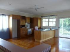  21 Eveline Street Margate QLD 4019 WOW! CHARACTER HOME WITH WATER VIEWS! East of Oxley! Beach end of street. Beautiful Western Red Cedar 4 bedroom home. Three living areas, 2 bathrooms & powder room. Large Tasmanian oak kitchen with breakfast bar. Private timber deck off living. Polished timber floors. Ideal for large family. Dual living potential. Side access to large garage. Good tenants. Property Code: 975 General Features Property Type: House Bedrooms: 4 Bathrooms: 2 Land Size: 455 m² (approx) Outdoor Features Garage Spaces: 1 Offers over $495,000 