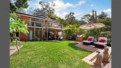  203 Prince Edward Park Rd Woronora NSW 2232 Waterfront Wonderland This perfectly positioned waterfront home is your new idyllic lifestyle, with stunning water and bushland views completely drenched in sunshine all day long with a fantastic level lawn area leading onto the rivers edge and your own private jetty and pontoon. - 5 Bedrooms - 3 Bathrooms - 3 car level parking off Severn Rd  - Kitchen plus downstairs kitchenette - 2 Large living areas - Study / Games Room - Access via Private road access off Severn Road or enter off Prince Edward Park Road near car-park/marina (walk a few doors down). - Jetty & Pontoon - North Facing yard - Boat Ramp - Tropical landscaped grounds 