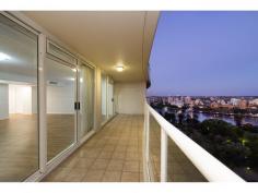  2403/132 Alice Street Brisbane City QLD 4000 Enviable Luxury Lifestyle - 174m2 Sub Penthouse in Quay West This exceptional Quay West property offers the ultimate luxury inner-city lifestyle with an outstanding location in the heart of the CBD, captivating vistas of the sparkling cityscape by night, and never-to-be-built out panoramic views of the Brisbane River, Botanical Gardens and the Kangaroo Point Cliffs by day. Experience elegant urban living with the very best of nature right on your doorstep - the lush Botanical Gardens are just 20 metres from your front entry. Located on the 24th floor of the prestigious Quay West Building, the rare combination of space, style, on-site facilities, and two car spaces, make this 174m2 sub-penthouse apartment the definitive statement for the discerning buyer. The spacious open-plan living and dining is framed with extensive glass windows and sliding doors, providing a spectacular panorama as a backdrop for stylish entertaining. The kitchen’s marble benchtops and quality European appliances are enhanced by a fabulous outlook over the river to Southbank. The balconies, measuring 29 metres in length, are accessible from all three bedrooms as well as the kitchen and living area, allowing you to make the most of our relaxed . General Features Property Type: Apartment Bedrooms: 3 Bathrooms: 2 Building Size: 218.00 m² (23 squares) approx Indoor Features Gym Built-in Wardrobes Dishwasher Ducted Heating Ducted Cooling Air Conditioning Outdoor Features Remote Garage Secure Parking Garage Spaces: 2 Balcony Deck Outdoor Entertaining Area Outside Spa Swimming Pool - Inground Expressions of Interest Closed 