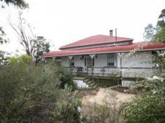  15 Palmer Avenue Warwick QLD 4370 Owner wants contract now!!!!! Sitting high on a ridge overlooking the Condamine River and the city of Warwick, White Cedars is a property that offers a unique opportunity to purchase a rambling Queenslander surrounded by nearly 3/4 acres of garden and native bush land. This property has been in the same family for 32 years, and the ambiance and atmosphere of a home that has been such a special place is apparent on entering.  Attributes include A large and adaptable floor plan Formal dining room with fireplace and french-doors Lovely formal sitting room with french-doors leading to the veranda Main bedroom with en-suite Two other bedrooms ( current configuration) Older style kitchen with family dining room Very functional older style bathroom Large wrap around veranda Office, laundry and small sitting room Private and peaceful location Tucked away at the end of a cedar lined driveway and from view of the street, only an inspection will reveal all this lovely old home has to offer. Structurally sound and in a good state of repair the home is absolutely fine the way it is or would make a great renovation project for those looking to create a prestige. General Features Property Type: House Bedrooms: 4 Bathrooms: 2 Land Size: 3326 m² (approx) Price per m²: $101 Indoor Features Ensuite: 1 Living Areas: 2 Toilets: 2 Study Broadband Internet Available Pay TV Access Open Fireplace Outdoor Features Secure Parking Garage Spaces: 1 Balcony Shed Fully Fenced $335,000 