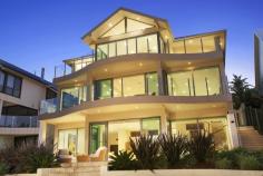  14 S Scenic Rd Forresters Beach NSW 2260 Per night: $650 to $1,300 Per week: $4,000 to $8,500 Maximum adults sleeps 8 Total adults & children sleeps 8 Bond required | Linen included 
 
 This architect designed tri-level beachfront is absolutely 
spectacular. From the moment you enter its front door you will fall in 
love with Sea Dream. The ultimate entertainer's delight Sea Dream is the
 perfect retreat for family groups. Featuring floor-to-ceiling windows, 
seamless indoor/outdoor living, multiple sitting areas and living spaces
 including kid's room, and two full kitchens, this holiday home offers 
the perfect retreat for family groups. Be amazed by the panoramic views 
that await you and enjoy super spacious interiors, ultra modern 
finishes, high ceilings and travertine tiling throughout. Take in fresh 
ocean breeze and wonderful outlook from all levels of this amazing 
house. Master bedroom contains a king bed, balcony with panoramic views,
 walk-in robe and en suite with corner spa, shower and views. Bedroom 2 
contains a king bed with built-ins and balcony. Bedroom 3 contains a 
queen bed and built-ins. Bedroom 4 contains two single beds and 
built-ins. 
 Living spaces with plasma TV, DVD player; surround sound; multiple sitting areas Ultra modern kitchens with electric cook top, oven, dishwasher, fridge, microwave Entertaining deck and balconies on all levels baring magnificent views; BBQ Direct beach access; sprawling lawns for kids to play; landscaped courtyard Secure entry; alarm; C-Bus system; intercom; sea breezes; remote double garage Main bathroom with shower, bath tub; two bathrooms contains shower, toilet 