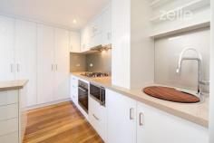  304/669 Dean Street,  Albury NSW 2640 Presenting an idyllic lifestyle apartment which has been meticulously upgraded and remodeled to the highest standard. The open plan living opens to the balcony with wonderful views over the Botanical Gardens and up to the Monument and adjoins a chefs kitchen boasting stone bench tops, glass splashback and loads of storage. A generous bedroom has southerly views and access to a luxurious en-suite. All the comforts of ducted heating and cooling, remote blinds, beautiful flooring and first class finishes throughout. Secure parking for 2 cars. Enjoy this perfect CBD location within a quality secure building. For Sale: $445,000	 