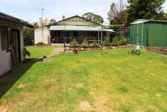  80 Hume Street Gloucester NSW 2422 For Sale: $345,000 Charming family home that reflects a bygone era with it’s high ceilings, ornate plasters and timber details. Comfortably modernised to include a new kitchen, 2 bathrooms, air conditioning, a wood fire and polished board floors. The 941 square metre yard is spacious with an inground pool, large garage with solar panels, chook shed and access from the rear lane. Presented in pristine condition and located in a quiet street, only an inspection will reveal the style and splendour of this home. 