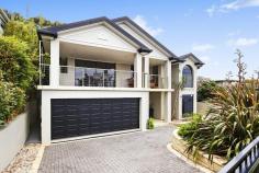  51 Barnhill Rd Terrigal NSW 2260 Per night: $400 to $700 Per week: $2,000 to $5,500 Weekend 3 night package: $1,500 Maximum adults sleeps 8 Total adults & children sleeps 12 Bond required 
 
 If you are in search of a spacious getaway with terrific views 
then Barnhill Beach House is the perfect retreat. Just five minutes walk
 to the beach, Barnhill Beach House is ideal for family groups, couples 
or corporate stays. This open plan house contains all of the luxuries 
enjoyed at home. Sit and take in the vast ocean views or take a dip in 
the plunge pool overlooking serene green surrounds. Only minutes to 
Terrigal esplanade and beach, Barnhill Beach House is a comfortable 
holiday home that combines style with beachside living. Master bedroom 
contains queen bed, en suite with spa, walk-in robe and views. Bedrooms 
2, 3 and 4 have queen beds, while bedroom 5 has 2 single bunk beds. 
*STRICTLY NO PARTIES / FUNCTIONS. 
 Main living space with plasma TV, Foxtel, other contains a plasma TV Wrap around kitchen with dishwasher, oven, gas cook top, walk-in pantry Outdoor entertaining terrace contains a pool with a leafy green outlook Large entertaining deck with BBQ, outdoor setting for six, ocean views Ducted air conditioning, Wi-Fi internet, secure entry gate, alarm Spacious master bathroom and en suite contains shower and spa bath 