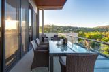  669 Dean St Albury NSW 2640 With views across the river & back to the Victorian Alps, the outlook from this modern well-appointed penthouse apartment is simply magnificent. Open plan meals, family & state of the art kitchen with Miele appliances including coffee maker, steamer, wine & bar fridge plus separate formal lounge with gas log fire. Quality internal finishes, European fixtures & high efficiency recessed lighting has been incorporated throughout. Multiple balconies provide wonderful outdoor living with views over Albury & Wodonga. • Four bedrooms, three bathrooms, powder room • Separate kitchen & meals with state of the art appliances • Separate formal lounge with gas log fire • Secure lift, basement parking & storage, 24hr security 