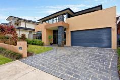  20 Cadman Ave West Hoxton NSW 2171 Designed with lifestyle in mind this superbly presented 4yr old 'Eden-Brae' designer home is a very impressive family residence, overflowing with the finest of finishes throughout. Boasting multiple living areas and an easy-care lifestyle, it is perfect for today's contemporary family. The home offers many sought after features. 4 great sized bedrooms upstairs all with their own private luxury ensuites and walk- in robes, the master bedroom also has a spa bath in its ensuite, a walk-in robe and balcony. For the family that loves to entertain you are presented with this stunning open plan luxury kitchen with gas cooking, electric oven, stone bench tops, dishwasher and breakfast bar with living room adjoining. Elegant living room with high ceilings and an abundance of natural light, a fireplace, dining area flows from the kitchen, a spacious theatre room and large laundry with extra storage area. There is internal access from the double lock up garage, plantation shutters and block out blinds, with tinted double glazed windows at the front. Situated in a highly sought after locale within short walking distance to private high school, local shopping centre and amenities and surrounded by like homes, this is one to add to your "Must See " List. Call NOW.  