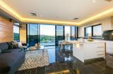  669 Dean St Albury NSW 2640 With views across the river & back to the Victorian Alps, the outlook from this modern well-appointed penthouse apartment is simply magnificent. Open plan meals, family & state of the art kitchen with Miele appliances including coffee maker, steamer, wine & bar fridge plus separate formal lounge with gas log fire. Quality internal finishes, European fixtures & high efficiency recessed lighting has been incorporated throughout. Multiple balconies provide wonderful outdoor living with views over Albury & Wodonga. • Four bedrooms, three bathrooms, powder room • Separate kitchen & meals with state of the art appliances • Separate formal lounge with gas log fire • Secure lift, basement parking & storage, 24hr security 