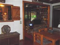  33 Orchard Rd Coconut Grove NT 0810 A unique opportunity to purchase an elevated Troppo constructed house in a magnificent tropical setting.  This residential block is zoned as RR (Rural Residential) 15 minutes to Darwin city.  Comprising of six bedrooms, two bathrooms and a three bedroom bungalow at the rear of this enormous 3760m2 RR (Rural Residential) block.  This one off house has numerous verandahs surrounding the house, high ceilings with beautiful leadlight skylights crafted by the owner. This is lifestyle at its finest and a unique opportunity for a Bed and Breakfast close to the city. There is a fenced in-ground pool and spa sheltered in the tropical garden with its rainforest setting.  The battle-axe block is completely private from the street and has an abundance of birds and wildlife.  One of a kind, this rural property so close to the city. Off the main road a tranquil paradise with its magnificent tropical rain forest and birdlife. A perfect setting for a Bed and Breakfast. This is a unique property for the astute investor. 