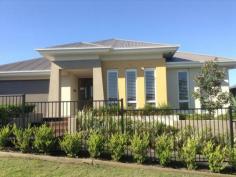  11 Paperbark Parade Aberglasslyn NSW 2320 This McDonald Jones former display home is one of a kind with luxury fittings throughout the entire property. This home can only be described as simply breath taking! Features include: * Ducted air conditioning & sensor lights throughout. * Grand foyer with inbuilt desk, timber flooring and beautiful artwork * Off the main entrance you will find a "teenagers or guest retreat" complete with three carpeted bedrooms all with built in robes & timber shutters, carpeted lounge room and study. This area also includes a second bathroom complete with shower, deep bath & separate toilet. All rooms are generous in size. * A second formal lounge is located off the kitchen with low lying window perfect as a theatre room. * A third living area is a feature in itself with floor to ceiling glass window with an outlook of the pond, gardens and water feature.This room has timber flooring and doors open wide onto the entertainment deck. GENERAL FEATURES Bedroom:  4 Bathrooms:  2 Fully Fenced EXTERNAL FEATURES Balcony Courtyard Deck Outdoor Entertaining Area INTERNAL FEATURES Built In Robes Dishwasher Ducted Cooling Ducted Heating $570 weekly Available Now Bond:  $2,280 