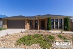  18 Waterbury Street Cranbourne VIC 3977 Ex-display modern inspired living showcases design excellence thru this four bedroom plus entertainer's floor plan. Without compromise this immaculate family home offers spacious formal and informal living, generous robed bedrooms with a stunning kitchen and dining area. 560 square metre allotment, remote control double lock up garage with rear access, ducted heating/cooling, alarm, led downlights , caesarstone bench tops to kitchen and vanity top to bathrooms and heaps of extras this superbly located home in the Carlisle Park Estate! With a bus stop nearby, only moments from Primary School and Lyndhurst College, short drive to Monash freeway entrance, minute's walk from the Shopping precinct this family home has been designed ready for you to enjoy your lifestyle NOW! - See more at: http://cranbourne.harcourts.com.au/Property/587805/VCR24676/18-Waterbury-Street#sthash.xCS4XMI1.dpuf 