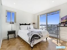  18/100 Tennyson Road Mortlake NSW 2137 Ultra Chic Urban Style This luxury three bedroom apartment captures the essence of contemporary living and presents an opportunity to purchase in a great location. The warm interior and open plan design brings together an expansive sun-filled living and dining area with neutral tones and stylish herringbone patterned timber floors. The gourmet seamless designed kitchen features caesarstone benchtops, abundant cupboard space, coffee toned glass splashback and Miele gas appliances. Keeping the space light and airy, glass doors open onto a wrap around balcony perfectly positioned for afresco dining. From the balcony climb a spiral staircase to the rooftop terrazzo perfect for entertaining with distant water views.  Three deluxe bedrooms with built in robes, main suite features a private balcony and chic ensuite. Fully tiled designer bathroom with stone bench top and contemporary tapware. Other features include security intercom, air conditioning, internal laundry with cupboards and caesarstone benchtop and a double car space with security entrance. Enjoy the lifestyle with cafes, restaurants and local shops close by. Surrounded by spectacular foreshore walkways and the convenience of public ... show more View Sold Properties for this Location View Auction Results General Features Property Type: Unit Bedrooms: 3 Bathrooms: 2 Building Size: 216.00 m² (23 squares) approx Indoor Features Air Conditioning Outdoor Features Garage Spaces: 2 Other Features Built-In Wardrobes,Close to Schools,Close to Shops,Close to Transport,Garden $1,200,000 