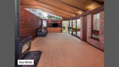  39-41 Mount Brown Rd Dapto NSW 2530 If you and your family appreciate plenty of space and are after a property with a real wow factor, then this family home is for you. Set on 1,834m2, the land also lends itself to a fantastic opportunity to develop for an astute investor or builder (STCA). The property is perfectly positioned and designed to capture the tranquil and leafy outlook. The stunning use of timber and glass in this funky architect designed and built home offers an abundance of natural light. Formal living, dining and kitchen areas open onto the terrace taking in the lovely outlook. North and East facing interiors embrace a sparkling swimming pool, whilst the vast open plan kitchen/casual area also flows out onto an elegant central courtyard. An attractive fenced yard at the rear of property ensures privacy. Brilliantly designed and engineered, the expansive flowing floor plan provides comfortable living both indoors and out. The property showcases large feature windows and extra high ceilings throughout, Cypress pine and Tallow wood hardwood flooring, freshly painted open plan kitchen, dining and living spaces, three good sized bedrooms with built-in wardrobes and a study or fourth bedroom depending on your accommodation needs. The living spaces flow out to a private balcony and a large undercover entertaining area overlooking the 11 metre swimming pool which is perfect for entertaining in the warmer months. The outdoor poolside bathroom and additional storage is an added bonus. The expansive block provides plenty of room for gardening, the pets or simply for the children the play.  To organize an inspection at this property, or to find out further details, phone Sharon Ford on 0407 126 077 or Michele Lay on 0409 461 756. 