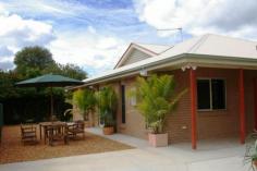  58A Bowen St Goondiwindi QLD 4390 A short stroll from the main hub of town you will find this secluded hideaway. Boasting 3 bedrooms, the main with en suite & walk in robe, the remaining bedrooms all fit queen size beds and have generous built in robes. The main bathroom is modern & sleek. There is an office/study that could be utilized as a 4th bedroom if you desired. A large lounge/ dining room services the home beautifully and opens into a large screened and tiled entertaining area that overlooks the park and is a short walk to the river walkway. The kitchen is well appointed with a gas cook top, electric oven, dishwasher, provision for a large refrigerator, large pantry & generous cupboard space. Outside you have a single car lockup garage & a carport, a pebbled area for more entertaining & your private driveway. This brand new home is impressively finished & would suit the most discerning buyer. Inspections are welcome.   For Sale $395,000 