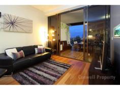  420 Queen St, Brisbane City, Qld 4000 Unique in its design and features, this 108m2 - 2 bedroom, 2 bathroom apartment is lined with high ceilings and perfectly polished Tasmanian Oak flooring which lead through full-length glass sliding doors out to a HUGE timber deck including a large personal SPA and Built-In BBQ - all overlooking the beautiful Brisbane River to the Story Bridge beyond. The superb full-sized kitchen with glass splash backs, double sinks and deep cupboards are akin to the finishes of the skyhomes. With generous car-parking and storage spaces included, you will have room to house the spare furniture and / or tools - keeping the apartment uncluttered without shedding all those precious things......... 