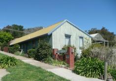  1/32 Jamieson Street Myrtleford Vic 3737 $178,000 Located at the top of Jamieson Street with views over the town this 4 bedroom unit has great potential. On the market at a reasonable entry level it consists of an open plan living area with a combustion wood heater and split system reverse cycle air conditioning, galley style electric kitchen, ceiling fans, built in robes in 3 bedrooms plus air conditioners in 2, a large decked outdoor area with excellent views and dual under cover car parking underneath. Admitting it does need a little modern updating which could be done over a period of time at this price it is affordable. Features Deck Outdoor entertainment area Electric stove Dishwasher Electric hot water system Ceiling fans Air conditioning Heaters Property Details  Property ID   1066 Bedrooms 		 4 Bathrooms 		 1 Car Ports 		 2 Land Area 		 653 m2 
