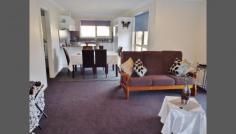  5/23 Heather Crescent, Park Grove, TAS 7320   $249,000 Presented is this very level Unit, approx 97m2,and located in a beautiful, quiet and peaceful, natural bush rural setting, elevated with relaxing urban and parkland views. Features Include: *2 large and spacious bedrooms with large built-in robes *Light and very spacious open plan lounge and dining *Excellent kitchen, ample bench space & cupboards plus dishwasher *Large Bathroom *Internal laundry *Large Decking for fresh air, sun and shade *Carpet in bedrooms *Single lockup garage, internal access, storage area *Extra parking in front of unit plus extra visitor parking 