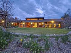  1354 Mountain Ash Road (Bungonia) Goulburn NSW 2580 "Hidden Gem" “HIDDEN GEM” Resort Style Family Residence on 100 acres Craftsman built , beautifully presented Set in acres of professionally designed minimum care gardens 100 acres of rolling hills, suit cattle and horses, 10 minutes from Goulburn, 2 hours Sydney Full size tennis court comprising latex sand compound and in ground salt water, solar heated, pool Homestead features Spacious formal lounge with Cheminees Philippe heating plus 2nd living room 4 king sized bedrooms all with excellent built in robes and views over the gardens and country Main with parents retreat, ensuite and walk in robe  Kitchen overlooking large informal dining and living , with effective wood heater Double insulated walls and ceiling 3 Toilets - 1 in ensuite, 1 conveniently off Living Room, and other next to Bathroom.  Double garage plus 4 bay machinery shed ( two secure with remote) 20,000 gallon tank, excellent abundant watering system  Bugle design steel cattle yards with crush and loading race  More features of this property : Western Red cedar windows throughout. External doors flow through to paved pergola areas on three sides ... show more View Sold Properties for this Location View Auction Results General Features Property Type: Acreage/Semi-Rural Bedrooms: 4 Bathrooms: 2 Building Size: 350.00 m² (38 squares) approx Land Size: 40.47ha (100.00 acres) (approx) Price per acre: $11,650 Indoor Features Ensuite: 1 Living Areas: 3 Toilets: 3 Study Workshop Broadband Internet Available Built-in Wardrobes Pay TV Access Dishwasher Open Fireplace Outdoor Features Remote Garage Secure Parking Carport Spaces: 2 Garage Spaces: 4 Open Car Spaces: 10 Courtyard Outdoor Entertaining Area Shed Fully Fenced Swimming Pool - Inground Tennis Court Eco Friendly Features Water Tank Other Features In Slab heating, Solar Heating for Pool. $1,165,000 