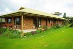  16 Welsh Street Bermagui NSW 2546 Retire In Stye - Brick Home - Convenient Location This Home Ticks All The Right Boxes.  Magnificent Ocean and Mountain Views. Located in a convenient area close to Beaches, shops, Shorting Club and the popular Bermagui Harbour. Features of this quality family home include: Four good sized bedrooms, two bathrooms, spacious kitchen & family area, north facing formal lounge and dining room with stunning views to Haywards Beach and Dromedary - Gulaga Mountain. The covered verandah is ideal for alfresco entertaining and has a ramp at the front and rear doors for easy access (wheel chair friendly). Property Code: 403566376 View Sold Properties for this Location View Auction Results General Features Property Type: House Bedrooms: 4 Bathrooms: 2 Outdoor Features Garage Spaces: 1 $420,000 