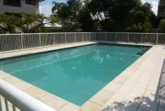  7/52 Queen Street SOUTHPORT QLD 4215 This modern 7 years new ground floor 2 bedroom apartment in a superb 
location in Southport in a well managed boutique complex is now listed 
for sale. Location of course is superb with the light rail station 
across the road, Australia Fair shopping 5 mins walk away and the 
Broadwater with its parklands a leisurely 10 minute stroll. The main bedroom has ensuite and attached is a private louvred balcony which has dual access from the bedroom and the lounge. Both
 lounge and dining are spacious and serviced by a compact yet well 
designed kitchen with stainless appliances including dishwasher and 
microwave. The second bedroom is more roomy than the normal second in most comparable units and has a huge mirrored triple wardrobe. The main bathroom has a good size shower and has the added advantage of not having the combined laundry like most. The laundry here is totally separate. Other unit features are security screens thruout and drapes instead of everyday verticals and air conditioning/ceiling fans are fitted as well. The
 complex has a lift, waste disposal chute and huge swimming pool with 
video intercom as an added security feature. Undercover secure parking 
also just in case you still want to have a car but why? Currently 
leased including fridge and washing machine till 21/10/2015 at $375 per 
week by an excellent lessee who wishes to stay on and with the sensible 
body corporate fees this complex offers make this unit an attractive 
investment at a purchase price far less than the owner paid when new. Maybe
 you are thinking of downscaling so buy now at this very very low price 
for a sound investment and when that yard becomes too big to mow here it
 is waiting for you to relax and retire. We look forward to taking your enquiry on this very special apartment. 