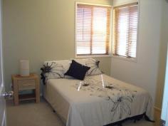  57 First Avenue,		WOODGATE QLD 4660 $599,000 FULLY FURNISHED EXECUTIVE CLASS RESIDENCE approx 100 metres from the beach at DESIRABLE WOODGATE BEACH. The FULLY FURNISHED property is situated in First Avenue, with an adjacent walkway providing quick beach access - feet in the water in about two minutes. The residence is the northern of the two units, and captures cooling sea breezes in summer and plenty of winter sunshine on the north-east facing top deck. The Woodgate Beach Hotel with restaurant is about a five minute leisurely stroll as is the direct to ocean boatramp. Theodolite Creek, the mighty Burrum River, and the National Parkland boardwalk and hiking tracks are all just a few minutes drive away. The FURNISHED unit would well suit owner occupier,or alternatively, be an excellent letting property for holiday makers. The rear yard is fenced. THE RESIDENCE FEATURES:- Ground Level 