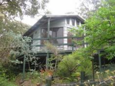  107 Cove Blvd North Arm Cove NSW 2324 A HOME AMONGST THE TREES WITH WATERVIEWS 
 This great family home is high set on the western side of Cove Blvd,
 is protected from the winds of the west and south and has filtered 
views of the Cove waterway. Comprised of two bedrooms with builtin 
wardrobes, open living, dining, kitchen area with slow combustion fire 
and bath with shower and separate toilet. This property could be used as
 a holiday home or permanent residence to enjoy your retirement.There is
 a single garage and carport, summer room/ studio with lead lighting, 
polished floor boards which could be used as the master bedroom or a 
teenager retreat with deckings surrounding the home taking advantage of 
the waterviews and shade house filled with plants all set on 904sqm. An 
added bonus to this property is a residential block of land which is a 
great extention of the grounds of the property the residential land is 
942sqm. In total the land is 1846sqm. EXCLUSIVE AGENT 
 
   
 
 Property Snapshot 
 
 
 
 Property Type: 
 House 
 
 
 Aspect Views: 
 water views 
 
 
 Construction: 
 Cladding 
 
 
 Features: 
 
 Balcony 
 Built-In-Robes 
 Coastal 
 Established Gardens 
 Garden Shed 
 Lounge 
 Outdoor Living 
 Sunroom Read more at http://teagardenshawksnest.ljhooker.com.au/5C7F65#q0S10rbbf5UMQQJY.99 