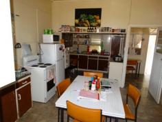  12 Best Street, Warra, QLD, 4411 HOUSE + HUGE SHED ON 2,024m2 The Vendor has moved on and needs this 2 bedroom timber home sold. Situated on a large 2,024m2 block in the township of Warra the property has town water connected, 3 x rain water tanks, power and mobile phone service.  Warra is a small township 30 mins from both Dalby and Chinchilla and has a primary school, school bus to Dalby high schools, post office and hotel. The shed has to be seen to be believed - 14mx9m with 3 large roller doors + 9m x 9m attached car accommodation with extra toilet. Power is connected and the floor is concreted.  Features of the home include: * Open eat in kitchen and lounge room with ceiling fan * 2 x bedrooms + sleep out. The main has built in cupboards and a ceiling fan * Bathroom and separate toilet * Downstairs laundry and extra storage room For further information contact the agent Warren Barker 0429 893 099. 