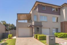  3/12 Margate Ave Holsworthy NSW 2173 Combining Looks, Lifestyle and Location, is this immaculate and modern 3 level home situated in the popular Mornington Estate, just a stone's throw away from Holsworthy Station. Boasting the following items of interest; - 3 good sized bedrooms, 2 with ceiling fans - Main bedroom providing Walk in robe and Ensuite - Modern Kitchen with ceaser-stone bench tops, S/Steel gas appliances and double drawer dishwasher - Spacious open plan living with floating timber floors - Ducted A/C, Alarm and Video Intercom - Singe remote garage - Roof terrace leading onto rear low maintenance yard featuring undercover Jacuzzi, perfect with summer almost upon us! - Access to resort style facilities including Tennis court and Swimming pool - Within a few minutes' walk to Holsworthy Train Station with a direct line into Sydney's CBD - Low strata levies of approx. $420 per quarter Freshly painted and vacant this beautiful home presents the perfect opportunity for the first home buyer or investor alike. Hurry! Inspect now before this train leaves the station!   