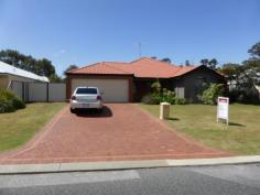 77 Meadow Springs Dr Meadow Springs WA 6210 BIG 728 SQM BLOCK 4 bedroom, 2 bathroom open plan living home with separate theatre room, central kitchen, family, games room, ducted air conditioning, gable patio. Backing on to public open space of the Golf Course. Side access to rear, room for workshop or swimming pool. Other features: Built-In Wardrobes,Garden 