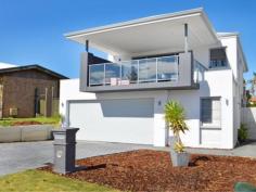  26A Kathleen Street Trigg WA 6029 Spectacular Near New Executive Residence Glorious Ocean Views Superbly located in one of Trigg’s best streets. Designed for entertaining and family living this stylish and elegant beachside home offers all the high tech amenities and facilities you would expect in a residence in such a prestige location. Your first glimpse inside will convince you that it is a wonderful place to live. Just footsteps to Trigg Surf Club. Stroll to one of Perth’s favourite swimming and surfing beaches. Nearby cafes and restaurants. Situated on a 404sqm green title block in a commanding position on the crest of a hill.  Less than 12 months old this showcase, quality home offers a marvellous lifestyle. It will suit those wanting plenty of room, but minimal maintenance.  Features include but are not limited to Lower Level Secure side entrance into home  Ideally located home office/study or music room Spacious family living or activity area. An ideal children or teenagers retreat Family area leads out to external living Separate 4th wc- powder room to service downstairs Bedroom no.2. Double sized with built in robes. (Great guest room)  Childrens wing Bedrooms 3 and 4. Spacious. General Features Property Type: House Bedrooms: 4 Bathrooms: 2 Land Size: 404 m² (approx) Indoor Features Living Areas: 2 Toilets: 4 Alarm System Study Built-in Wardrobes Dishwasher Split-system Air Conditioning Reverse-cycle Air Conditioning Outdoor Features Remote Garage Secure Parking Garage Spaces: 2 Balcony Courtyard Outdoor Entertaining Area Fully Fenced From 1,600,000 