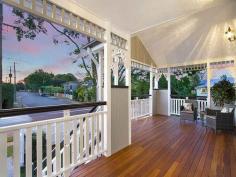  12 Dewar Terrace Sherwood QLD 4075 This beautifully presented, meticulously renovated Queenslander, on a 
wonderful, deep 888m2 flat block, sets the bench mark for fabulous 
family living. The original home dates back to around 1900 and the 
architect has successfully blended classic charm with contemporary 
style. 
 
The main living areas are so generous in space, with their 12ft high VJ 
ceilings, an abundance of windows and floor to ceiling b-fold doors that
 allow a smooth flow, out to the large, covered rear entertainment deck,
 that overlooks the lush flat lawn and rear gardens. 
 
Linked to these living areas is the most marvelous kitchen. From the 
beautiful Caesar stone bench tops, state of the art appliances, wide 
usable work stations, well-crafted cupboards, Butler's sink, and 
Butler's pantry, to the extras that just give this space the 'wow' 
factor. It's the light, the design, the quality of the workmanship that 
makes such a statement. 
 
There a four bedrooms and two bathrooms on this level, with the master 
suite consisting of original French doors opening out to the wide front 
veranda, an extensive walk in robe (with a wardrobe lift) and an 
immaculate ensuite, where the choice of texture and colour blend so well
 with the classic style bedroom. 
 
A wide internal staircase, crafted from beautiful 'Kwila'timbers, with 
an iron balustrade, leads you down to the lower floor, where another 
generous living area, complete with wet bar/mini kitchen allows you to 
entertain in a relaxed manner. Linked to the outdoors via floor to 
ceiling bi-fold timber doors, the room effortlessly spills out to the 
paved patio and the back garden. 
 
This level also incorporates a fifth bedroom/study another elegant 
bathroom, laundry and internal access to a separate storage room (man's 
cave) and extra-large double garage, with automatic doors. The driveway
 has been designed so there is adequate room to turn around. You need 
never have to back out of your driveway again. 
 