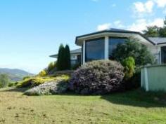  20 Scenic Hill Road Huonville TAS 7109 Magnificent Home, Magnificent Views This grand home reigns over the township of Huonville, the Huon Valley and the beautiful Huon River. Surrounded by an acre of garden, two minutes to the shopping centre, 35 minutes to Hobart and with cows grazing next door, the property certainly has absolutely everything you dream of.  Floor to ceiling windows and external decks allow you to enjoy the full panorama while you entertain both indoors and out.  The home has a large open central living area, with a state of the art kitchen positioned to one side. There are two wings to the home. The master bedroom, walk-in robe and en-suite, office and two larger rooms, are in one wing while the main bathroom and three spacious bedrooms, all with built-ins, are in the west wing, suggesting the home will suit the extended family, the entertainer, or just great for when the teenagers return. Double garage, carport, garden shed along with plenty of open parking on this internal block also make it ideal for those of you with lots of toys. Please call Derwent Real Estate to organize a private viewing. General Features Property Type: House Bedrooms: 5 Bathrooms: 2 Building Size: 222.97 m² (24 squares) approx Land Size: 0.51ha (1.26 acres) (approx) Indoor Features Ensuite: 2 Living Areas: 2 Toilets: 2 Study Built-in Wardrobes Dishwasher Outdoor Features Remote Garage Secure Parking Carport Spaces: 2 Garage Spaces: 2 Open Car Spaces: 4 Deck Outdoor Entertaining Area Shed Fully Fenced Offers Over $549,000 