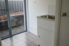 154 The Point Dr Port Macquarie NSW 2444 Quality Inclusions within this brand new home begin with smart street appeal and easy-care gardens. The formal living is separate to the family and dining, offering a great space for entertaining away from the busy areas of the household. The functional kitchen includes a walk in pantry, plenty of bench space, dishwasher and has a great flow to the family/dining and covered outdoor alfresco area. The separate media room is a perfect place for the kids or a commodious office space.  The master bedroom, complete with ensuite and walk-in-robe, is positioned at the front of the house, offering seclusion and privacy. The remaining three bedrooms are all equipped with built-in-robes and include hanging and shelving space. The main bathroom with separate toilet is within close proximity to the bedrooms and the kitchen for family use.  The light filled laundry ensures the common damp feel of this room is not felt at all in this home, with direct access to outside for added convenience. Remote control double garage comes as standard.  Other features include: durable wall to wall carpet in all bedrooms plus the formal living and media rooms, chic tiles in the family/dining room, window furnishings, fly screens, TV antenna, NBN ready, energy efficient light fittings, neat and low maintenance landscaping, driveway, clothesline and letter box. This house comes complete! All you have to do is turn the key.  (Photos are used for promotional purposes only and are not the true image of the final build) 