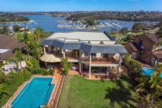  12 Edgecliffe Esplanade Seaforth NSW 2092 Resort 
style with a floor plan designed for entertaining makes this impressive 
waterside property a standout option for families that love living life 
to the full. Enjoying
 the exclusive surrounds of Edgecliffe Esplanade, its inspired design 
fully capitalises the truly spectacular 180° panoramas over Middle 
Harbour from Northbridge, the City and through to The Heads. Su perb
 interiors are perfectly laid out for premium family living. The elegant
 formal lounge and dining are framed in walls of glass constantly 
drawing the eye to the visually exciting panorama. The casual living and
 dining also enjoy water views and are well placed next to the large 
granite kitchen whilst a further family room provides an ideal teenage 
retreat. The
 rear of the property is equally as beautiful, enjoying a premium North 
aspect, generous alfresco terrace, solar heated pool, level lawns and 
versatile poolside cabana / self-contained accommodation. There is rear 
lane access to a further car space, boat or trailer storage area.   The
 grand master retreat is a perfect parental hide-away featuring a 
stunning terrace over looking Middle Harbour, his and her dressing room 
and marble ensuite. Four additional substantial bedrooms with built-in 
robes, marble ensuite or bathroom are complemented by a large home 
office with ensuite. 