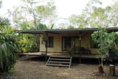  Herbert, NT 0836 This lovely two bedroom home is a great property with loads of options to expand as the family grows!!!  This cool and inviting family home is all just a short drive from the golf course and Humpty Doo community district center. This is truly is a rural oasis which is very welcoming - you may just want to stay and not leave comes with • Large Front verandah and a smaller rear veranda provides shade for the home as do the tall trees and well established gardens • Large kitchen and breakfast bar with open plan living, dining and kitchen areas • Tiled floor throughout living areas and carpeted bedrooms • Water Tank plunge pool, native and tropical gardens plus established lawns and paved areas surround the home  • 6LPS bore  • Large powered garage/workshop  The property also has a shed and a undercover area/veranda for a demountable/container at the rear of the property. 