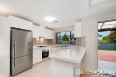  43 Ardley Avenue KELLYVILLE NSW 2155 The ultimate address for those seeking low maintenance living a stroll to all key amenities, this well-proportioned & stylishly contemporary two level townhouse is just footsteps to the Plaza & city express bus, and so convenient to popular schools. Clean modern lines showcase light-filled open plan interiors featuring combined lounge & dining and a sophisticated Miele gas kitchen boasting stainless steel appliances, 40mm CaesarStone bench-tops & polyurethane cupboards. Quality Grohe tap-ware & floor to ceiling tiles lend a designer flourish to the bathrooms & there are built-ins to all bedrooms; ample master with ensuite. The property enjoys reverse cycle ducted a/c throughout, video security intercom, an alarm & porcelain floor tiles. Level, secure & perfect for kids & pets at play, the large grassed courtyard garden with entertaining deck embraces a sun-kissed northerly aspect with scope for further landscaping if desired. There is a double remote control lock-up garage.   Offers over $720,000 