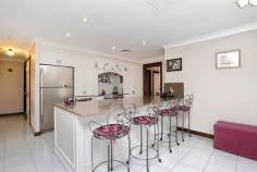 63 Myall Rd Casula NSW 2170 Being offered to the market for the very first time comes this wonderful home on 630.7sqms of land. A large frontage and a 2 1/2 car garage with drive through access allows for plenty of parking space. It features an elegant formal lounge and dining room, accompanied by a state of the art kitchen (recently renovated) and an extra large meals/entertaining area. There are 4 bedrooms, all with ultra modern ceiling fans, ducted air throughout the home and recently renovated main bathroom and en suite. The backyard has a storage shed and is a fantastic size with opportunity for a pool and an extended entertaining area. This home is complete leaving you absolutely nothing to do but move in and enjoy.  If you are looking for that perfect family home... Look no further, book your inspection today and make it count!  